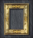 gold frame on Dark grey black slate background or texture