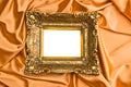 Gold Frame On Gold Satin Royalty Free Stock Photo