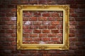 Gold frame on old brick wall Royalty Free Stock Photo