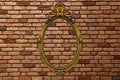 Gold frame on old brick wall Royalty Free Stock Photo