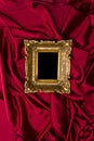 Gold Frame On Red Satin