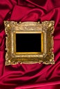 Gold Frame On Red Satin