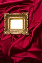 Gold Frame On Red Satin Royalty Free Stock Photo