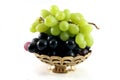 Gold fruit dish with grapes Royalty Free Stock Photo