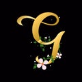 Gold G letter with flowers, alphabet illustration on black