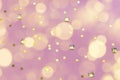 Gold gems and star confetti on a pastel pink background Royalty Free Stock Photo