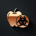 Gold Genetically modified apple icon isolated on black background. GMO fruit. Long shadow style. Vector