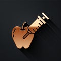 Gold Genetically modified apple icon isolated on black background. GMO fruit. Syringe being injected to apple. Long