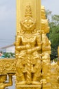 Gold giants statue. Royalty Free Stock Photo