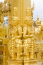 Gold giants statue. Royalty Free Stock Photo