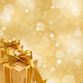 Gold Gift Box On Abstract Gold Background