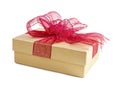 Gold gift box with red ribbon Royalty Free Stock Photo