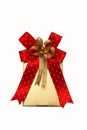 Gold gift box with red ribbon on white. Royalty Free Stock Photo