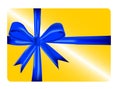 Gold gift card with blue ribbon Royalty Free Stock Photo