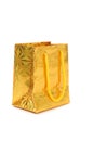 Golden gift holiday bag on white background Royalty Free Stock Photo