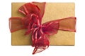 Gold gift with red bow isolated Royalty Free Stock Photo