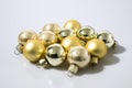 Gold glass christmas balls in a white background Royalty Free Stock Photo