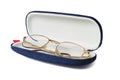 Spectacles in blue opened fabric case isolated on white Royalty Free Stock Photo