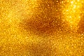 Gold glitter background, Gold abstract background with blurred bokeh, Abstract bokeh lights with soft light background. Royalty Free Stock Photo