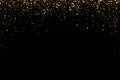 Gold glitter background with shiny light confetti on black background. Golden shimmery texture for luxury background