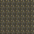 Gold glitter dots on black background. Royalty Free Stock Photo