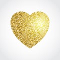 Gold glitter heart isolated on white background.