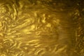 Gold glitter liquid flow texture background