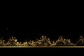 Gold glitter texture on a black background. Abstract particles of golden color, flow of wavy glitter confetti. Festive Royalty Free Stock Photo