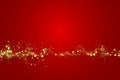 Gold glitter texture on a red background. Abstract golden colored particles, flow of wavy shiny confetti. Festive Royalty Free Stock Photo