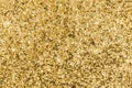 Gold glitter texture sparkling shiny wrapping paper background for Christmas holiday seasonal wallpaper  decoration, greeting Royalty Free Stock Photo