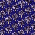 Gold glitter tree and snowflake pattern on blue Royalty Free Stock Photo