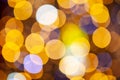 Gold glittering christmas lights. Blurred abstract background, close-up Royalty Free Stock Photo