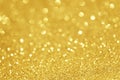 Gold glittering christmas lights. Blurred abstract background Royalty Free Stock Photo