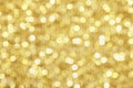 Gold glittering christmas lights. Blurred abstract background Royalty Free Stock Photo