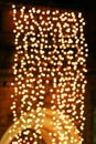 Gold glittering christmas lights. Blurred abstract background Royalty Free Stock Photo
