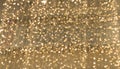 Gold glittering christmas lights. Blurred abstract background Royalty Free Stock Photo