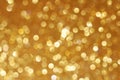 Gold glittering christmas lights. Blurred abstract background Royalty Free Stock Photo