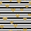 Gold glittering confetti hearts on black stripes seamless pattern