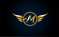 gold golden M wing wings alphabet letter logo icon with classy design for company and business