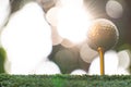 Golden golf ball is the world`s biggest sport Royalty Free Stock Photo