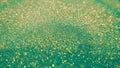 Gold & green glitter bokeh background. Abstract glittering shimmer. Vintage lights shiny backdrop. Golden dust sparkles. Royalty Free Stock Photo