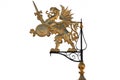 Gold griffin weather vane on green tower Royalty Free Stock Photo