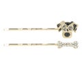 Gold hairpins on a white background with shiny gemstones, crystals.