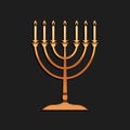 Gold Hanukkah menorah icon isolated on black background. Religion icon. Hanukkah traditional symbol. Holiday religion Royalty Free Stock Photo