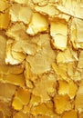 The gold has a textured surface that reflects light unevenly, resulting in a rich, shimmering quality Royalty Free Stock Photo
