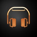 Gold Headphones icon isolated on black background. Earphones. Concept for listening to music, service, communication and