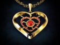 Gold heart necklace decorated with ruby gemstones Royalty Free Stock Photo