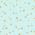Gold heart seamless pattern. Golden chaotic confetti-hearts on blue background. Symbol of love, Valentine day holiday Royalty Free Stock Photo