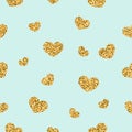 Gold heart seamless pattern. Golden chaotic confetti-hearts on blue background. Symbol of love, Valentine day holiday Royalty Free Stock Photo