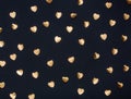 Gold heart stickers on dark textured background Royalty Free Stock Photo